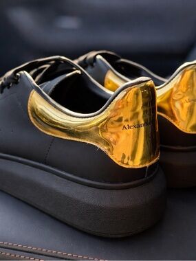 Alexander McQueen Black Sneakers with Gold Heel Detail
